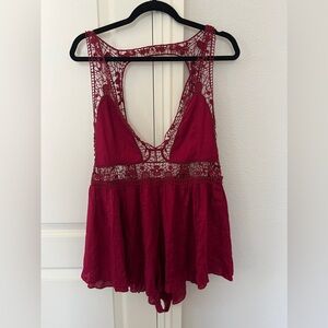 Free people intimates romper in a reddish burgundy color. So sexy! Size small .